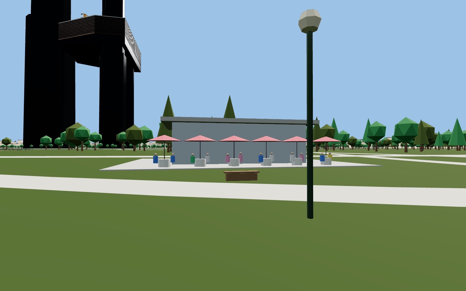 Café terrace with umbrellas in the park, from the fly-through